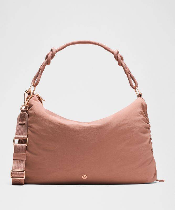 lululemon – Wandelbare, raffbare Crossbody-Tasche Groß 16 L – Gold – Größe 6 l - Toasted Pink/Rose Gold