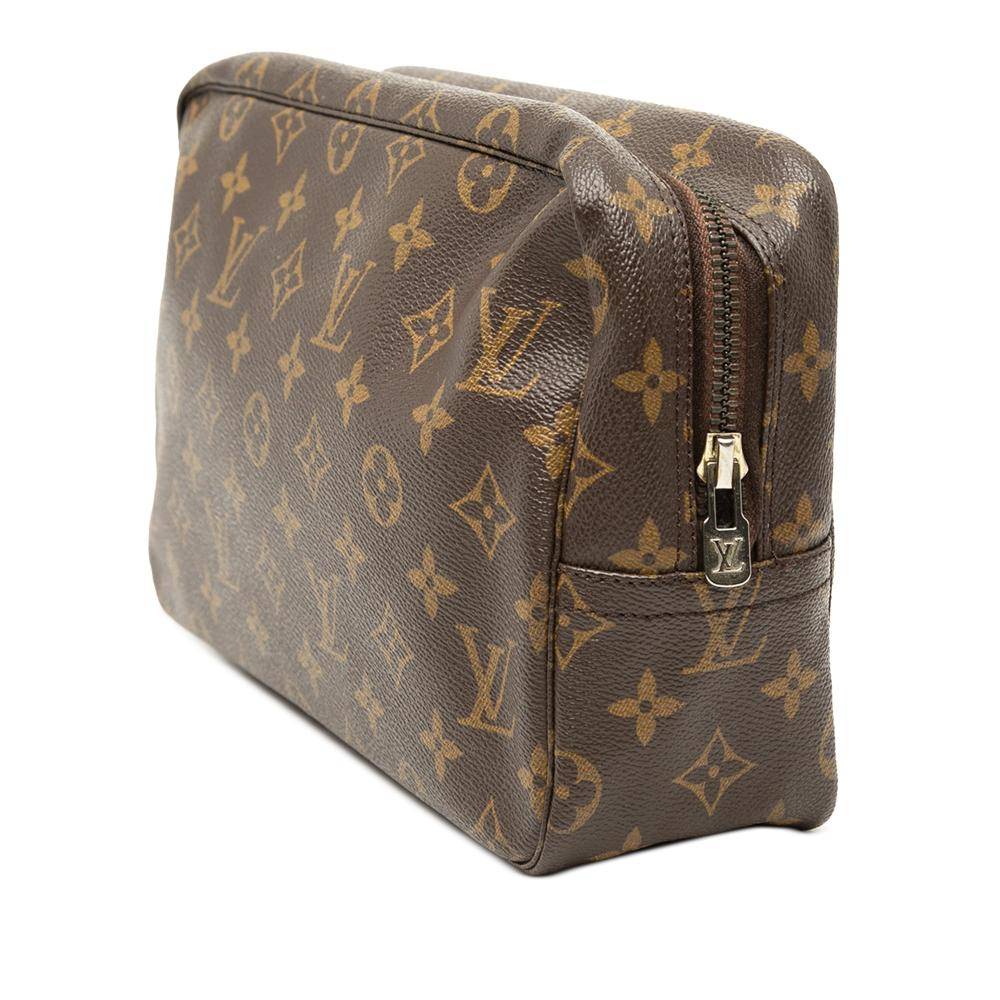 Louis Vuitton Vintage Louis Vuitton Trousse Toilette L 16cm x W 28cm x D 8cm - Clutches hos Magasin.