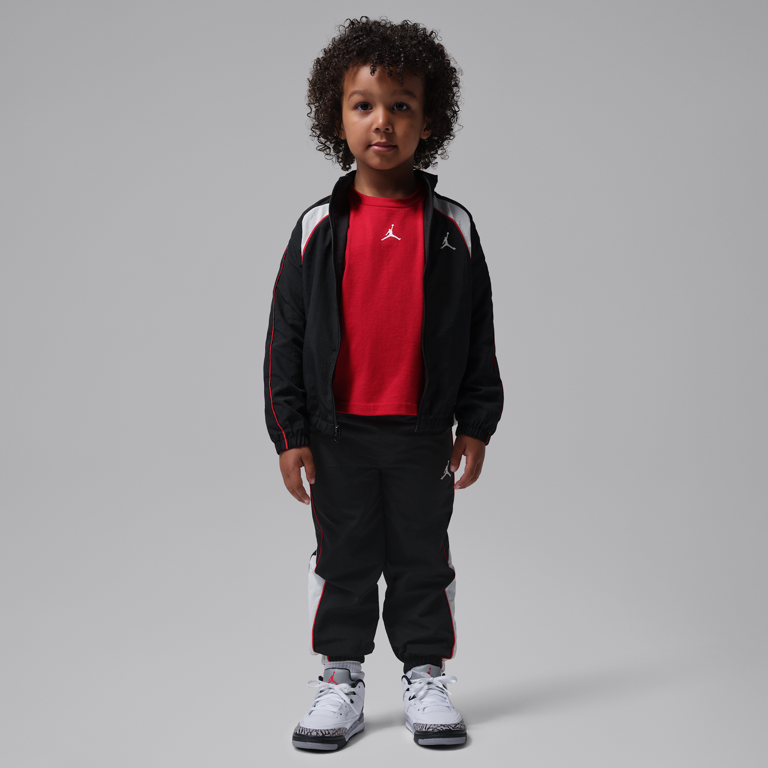 Jordan Colorblock-sæt i to dele med vindjakke med kantbånd til småbørn - sort