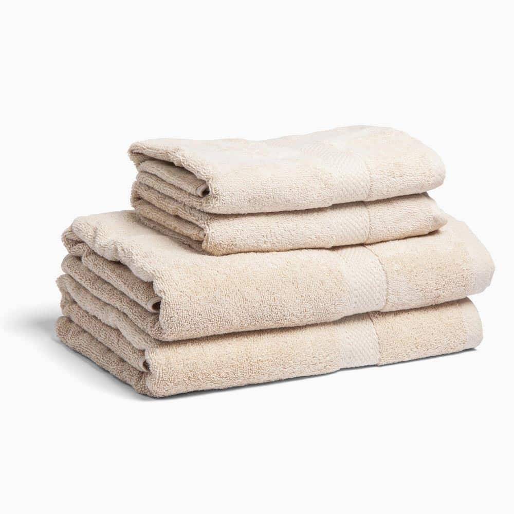 Sandfärgad handduk med namn Fairtrade - 90x150 cm (90x150 cm)