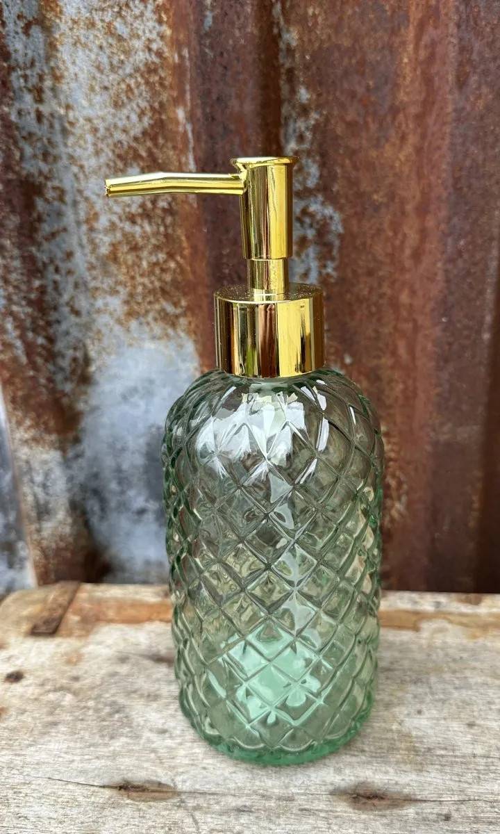 Tvålpump i grönt glas med guld pump
