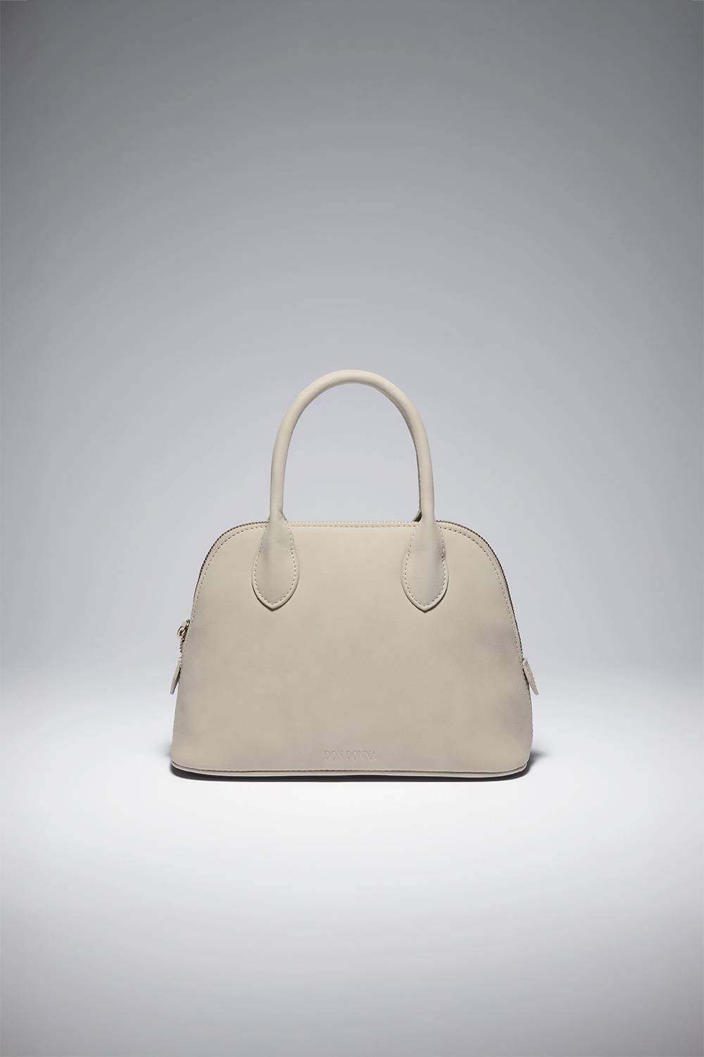 Beige väska i mockaimitation
