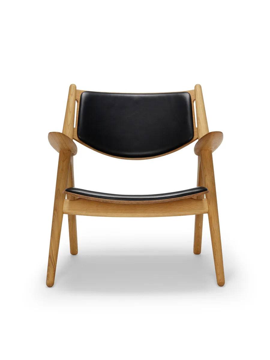 CH28 af Hans J. Wegner Eg-valnød-lædergruppe C / Lak - Jacobsen Plus