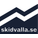 Skidvalla Logotyp