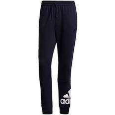 Essentials logo pant adidas Essentials French Terry Tapered Cuff Logo Pant Men - Legend Ink/White