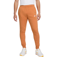 Arancione - Pantaloni da jogging Nike Sportswear Club Fleece Joggers - Hot Curry/Hot Curry/White