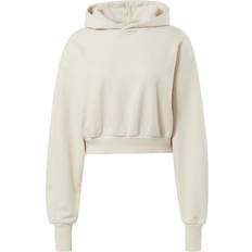 Cream hoodies Reebok cropped hoodie in off CREAM