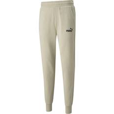 Puma Pantalón Casual ESS Hombre - Gris