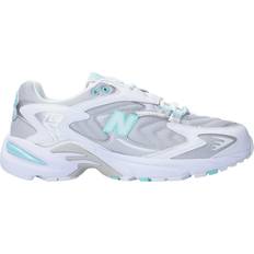 New Balance Turquoise Trainers New Balance 725 trainers in and aqua