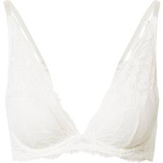 Calvin Klein White Bras Calvin Klein Seductive Comfort Lotus Lightly Lined Plunge Bra - Ivory