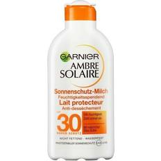 Garnier ambre 30 Garnier Ambre Solaire solskyddsmjölk, LSF 30, fuktgivande solkräm