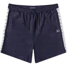 Fred Perry Byxor & Shorts Fred Perry – Mörkblå shorts trikå tejpad detalj