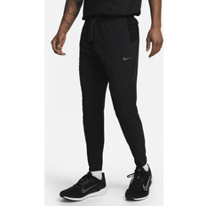 Réflecteurs Pantalons Nike Jogginghose Dri-FIT Rundvn Phenom - Noir