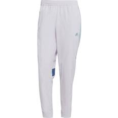 Silver - Träningsplagg Byxor adidas Träningsbyxor Tiro Woven - Lila/Blå