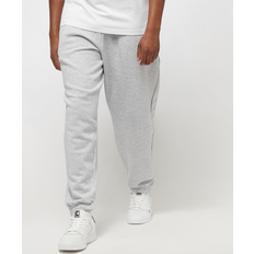 Karl Kani Bukser & Shorts Karl Kani Essentials Askegrå Joggingbukser i Afslappet Pasform Med Manchetter - Askegrå