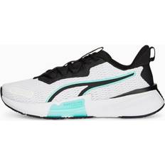 Puma White Gym & Training Shoes Puma Powerframe Tr Trainers White Woman