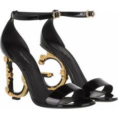 Dolce & Gabbana Sloffen en Sandalen Dolce & Gabbana Polished Calfskin Sandals With DG Baroque Heel Black