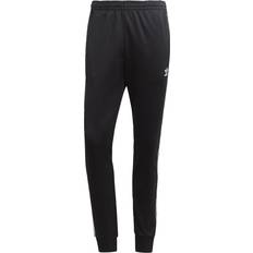 Hosen adidas Jogginghose Adicolor Classics SST Tracksuit Bottom IA4791 Schwarz Slim Fit