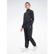 Reebok Jumpsuits & Overalls Reebok Damen Id Energy Trainingsanzug, Schwarz