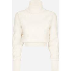 Dolce & Gabbana Wool fisherman’s rib turtle-neck sweater with DG logo