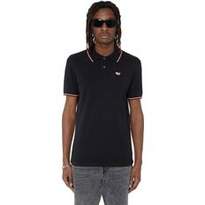 Diesel Herren Poloshirts Diesel Polo con motivo righe Polo Uomo Nero Nero