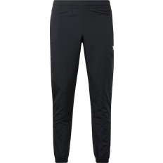 Reebok Hosen Reebok Jogginghose Vector HK7077 Schwarz Slim Fit