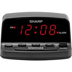 Sharp digital alarm clock with keyboard style controls battery back-up easy t