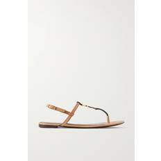 Saint Laurent Sloffen en Sandalen Saint Laurent Cassandra Slingback Sandalen Aus Leder - Braun