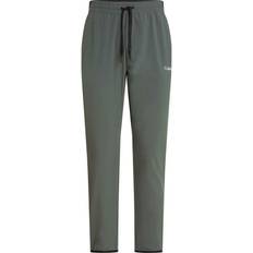 Calvin Klein Pantalones Calvin Klein Pantalón largo Woven CK Sport verde grisáceo - Green