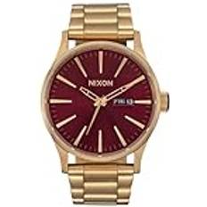 Nixon Sentry SS rostfritt dag/datum 42 mm WR 100 meter A356, Oxblood solstrål/guld, En storlek, Vakt SS