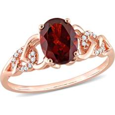 Rose Gold Rings 1.40 carat ctw Oval-Cut Garnet Ring in 10K Rose Pink Gold with Accent Diamonds