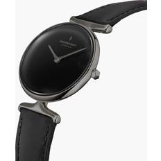 Ure Nordgreen Dame Dansk minimalistisk analog Sølv Urkasse Sort Skive 32mm Sort læderrem 32mm