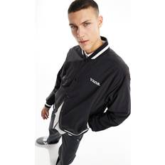 Vans – Moore – Svart bomberjacka collegestil-Svart/a