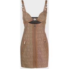 Leather Dresses Versace Allover leather-trimmed cutout minidress brown