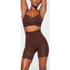 Skiing - Women Shorts SKIMS Mid Thigh Short Deep Neutral Seamless Sculpt