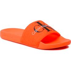 Herr - Orange Innetofflor Calvin Klein Sandaler och Slip-ons Jeans Slide Monogram Co YM0YM00061 Shocking Orange SNX 8720108130615 509.00