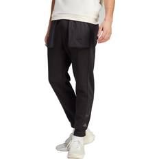 Pantalons Adidas adidas City Escape Jogginghose Herren schwarz