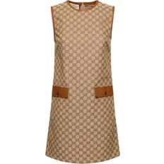 Gucci Klänningar Gucci GG leather-trimmed canvas minidress brown