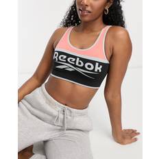 Reebok kerys seamless crop top bralette in black and orangeXS