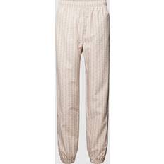 Lacoste Beige Byxor & Shorts Lacoste Pantalon De Survetement - Sawdust/Lapland
