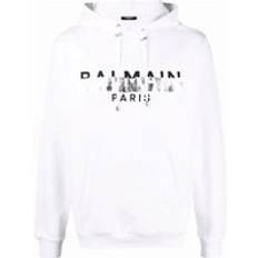 Balmain Man Jumpers Balmain Men's Foil Tape Logo Print Hoodie in White 42/Regular