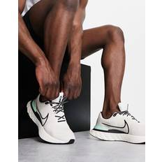 Nike Running React Infinity Run Flyknit trainers in off white