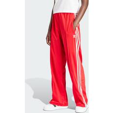 Röda - Unisex Byxor adidas Firebird Loose Trackpants Better Scarlet