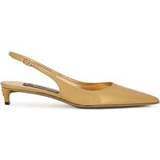 Dolce & Gabbana Laced Heels & Pumps Dolce & Gabbana Metallic patent leather slingback pumps gold