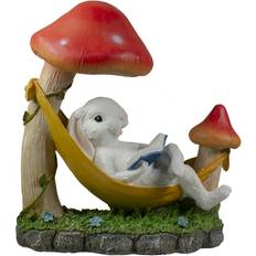 Northlight Mushrooms and Rabbit in Hammock Outside Garden Statue