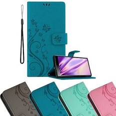 Fundas de teléfono móvil Cadorabo Funda Libro para Sony Xperia 10 Xperia XA3 en LILA OSCURO FLORAL Cubierta Proteccion en Dise o de Flor con Cierre Magnetico, Funcion de Suporte e 3 Tarjeteros Etui Case Cover Carcasa