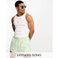 One Size Swimming Trunks ASOS DESIGN swim shorts in short length in light green2XS