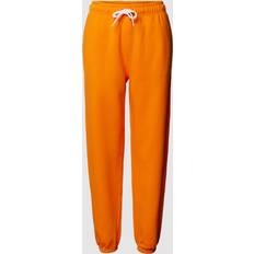 Polo Ralph Lauren Damen Hosen Polo Ralph Lauren Sweatpants mit elastischen Beinabschlüssen in Orange, Größe