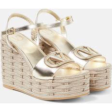 Valentino Garavani Schuhe Valentino Garavani Wedge-Sandalen VLogo Signature aus Metallic-Leder Metallic