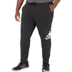 Pants & Shorts adidas Essentials Badge of Sport Mens Tapered Pants LT Black